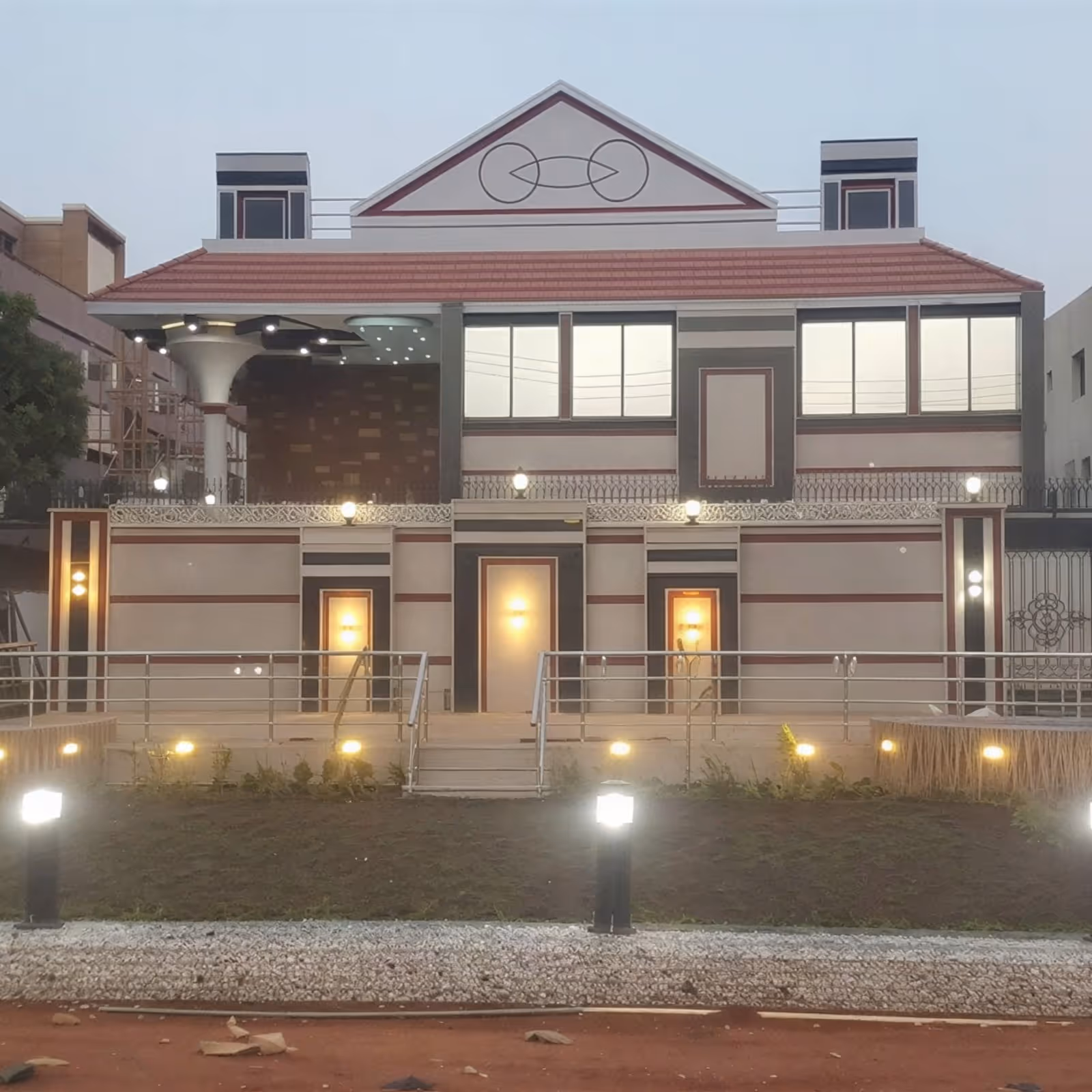 Additional view of the private villa showing the residence and surrounding site treatment.